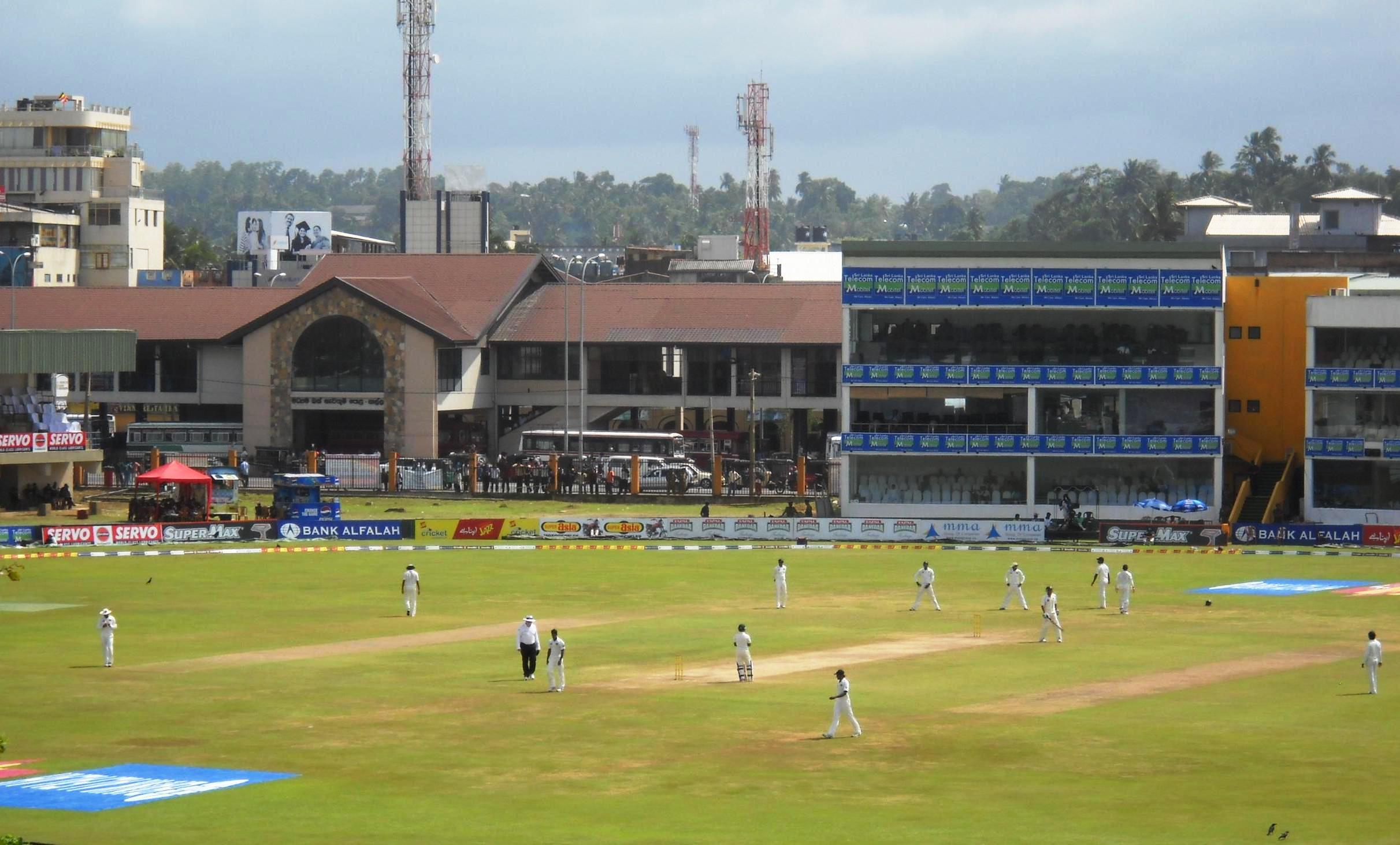 Cricket match day action